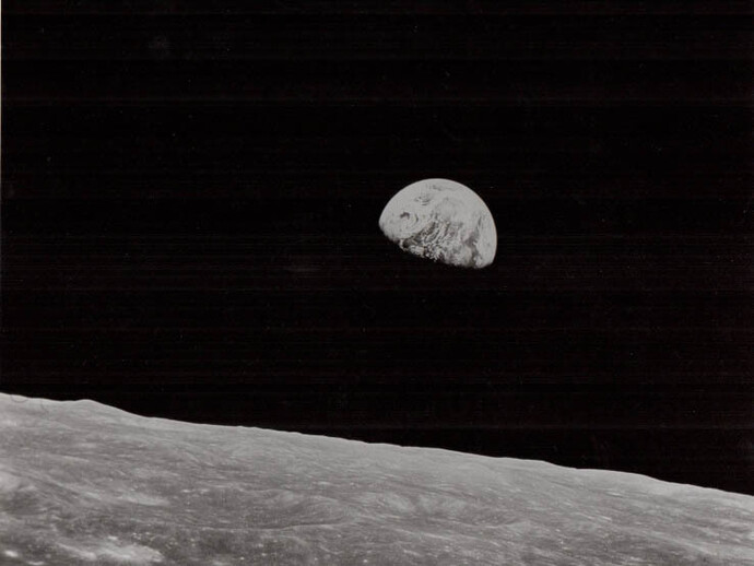 William Anders, Earthrise, the first-ever witnessed by human eyes, Apollo 8, December 1968, [AS8-14-2383], caption on verso, Vintage gelatin silver print, 20.4 x 25.9 cm
