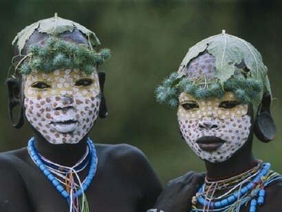 Mursi children; celebrations feature dances, religious rites, and other festivals