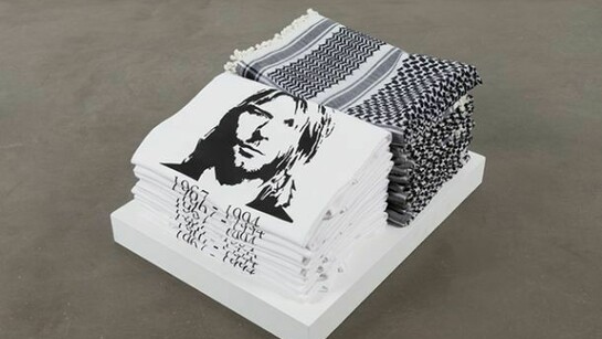 Emily Jacir, Bethlehem street corner  1998, 10 keffiyehs, 10 Cobain t-shirts, 6 1/2 x 17 1/2 x 13 in/16.5 x 44.5 x 33 cm