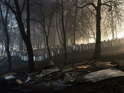 Giorgio Bianchi, Behind Kiev's barricades: Riot police deploy in a park next to the old stadium of Dynamo Kiev, preparing to storm the anti-government protesters.