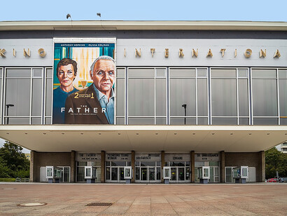 Kino International (Cinema International) at Karl-Marx-Allee 33 in Berlin-Mitte. Built between 1961 and 1963 to a design by architect Josef Kaiser, the building is designated as a historic landmark, Germany