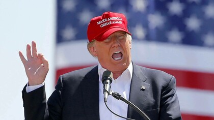 President Donald Trump leaves after speaking during a Make America Great Again rally at Fayetteville Regional Airport