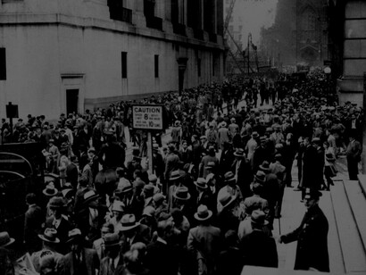 Crowds panic in the Wall Street district of Manhattan due to the heavy trading on the stock market in New York City on Oct. 24, 1929