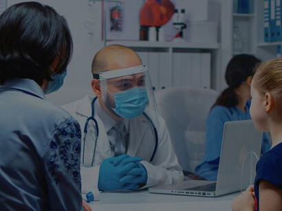 Amidst the challenges of COVID-19, a pediatrician specialist in medicine, donning protective gear, diligently offers healthcare services, consultations, and treatments to young patients in a hospital setting