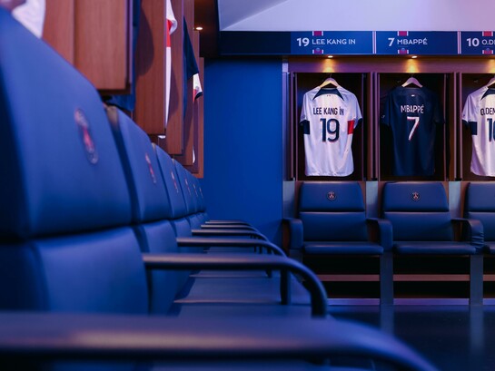 Inside a professional football locker room in Paris, Île-de-France, France