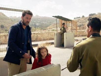 A father and his daughter negotiating with border control in the film 'The Present'
