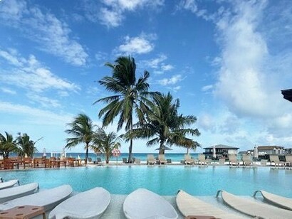 A luxury escape where white sand meets turquoise water