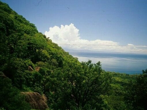 The serene beauty of Malawi’s landscape—green hills embracing the vastness of Lake Malawi—leaves an unforgettable impression on every visitor