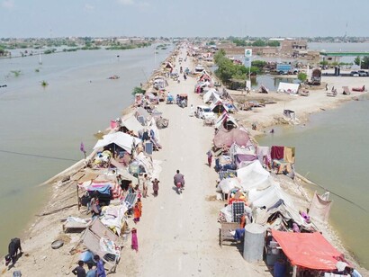 Flood survivors camp in Pakistan. Floods caused multiple million of people to leave their homes and adapt to new uncomfortable situations