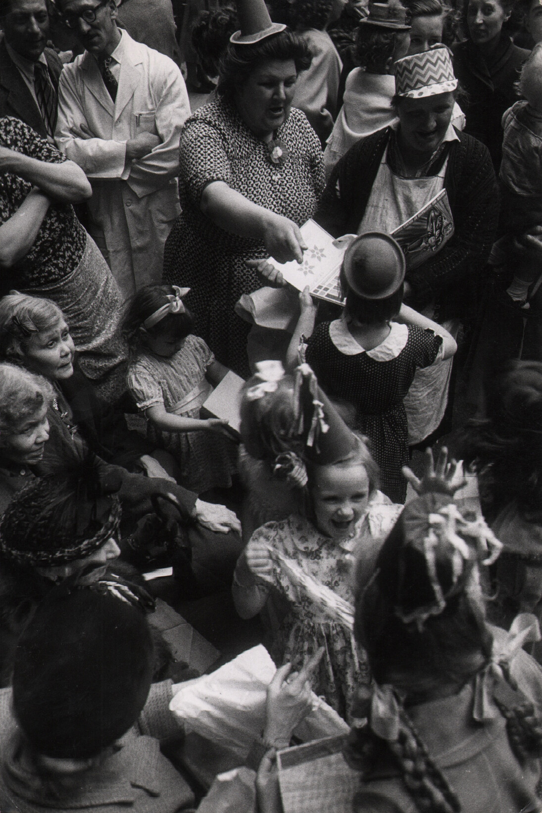 Ernst Haas, Queen’s Coronation Street Party, London, 1952. Vintage silver gelatin print. Estate stamp on print verso. 6.5 x 10 inches © Ernst Haas, courtesy Atlas Gallery