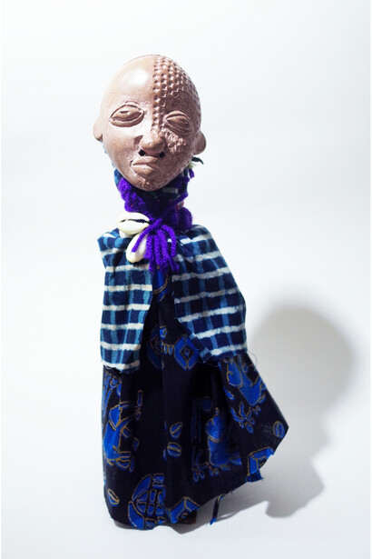 Creation Vickie Frémont made with a plastic bottle and mask made with clay