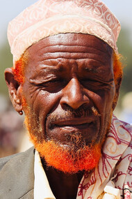 The wrinkles on this elder's face tell a story of years lived with wisdom, a living testament to the timeless proverbs that guide Somali life and communication