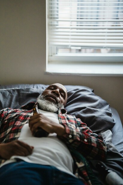 A man sleeping in a shirt 