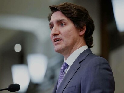 Canadian Prime Minister Justin Trudeau speaking on behalf of his country