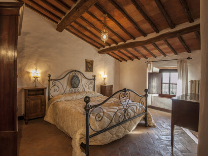 Una delle camere da letto della foresteria