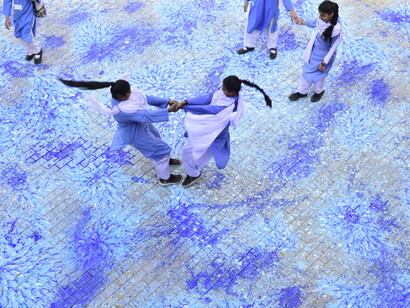 Imran Qureshi, Out of Blue, 2020. Site specific installation created in cooperation of Zindagi Trust Foundation and Shehzad Roy to support Khatoo-i-Pakistan Government Girls School. Courtesy of the artist