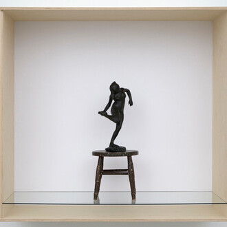 Haim Steinbach, dancer with raised right foot, 2011, Wood, plastic laminate and glass box; wood stool; painted bonded bronze Degas statuette, 52 x 56 x 25 5/8 inches; 132.1 x 142.2 x 65.1 cm. Collection Statens Museum fur Kunst, Copenhagen. Courtesy the artist and Tanya Bonakdar Gallery, New York