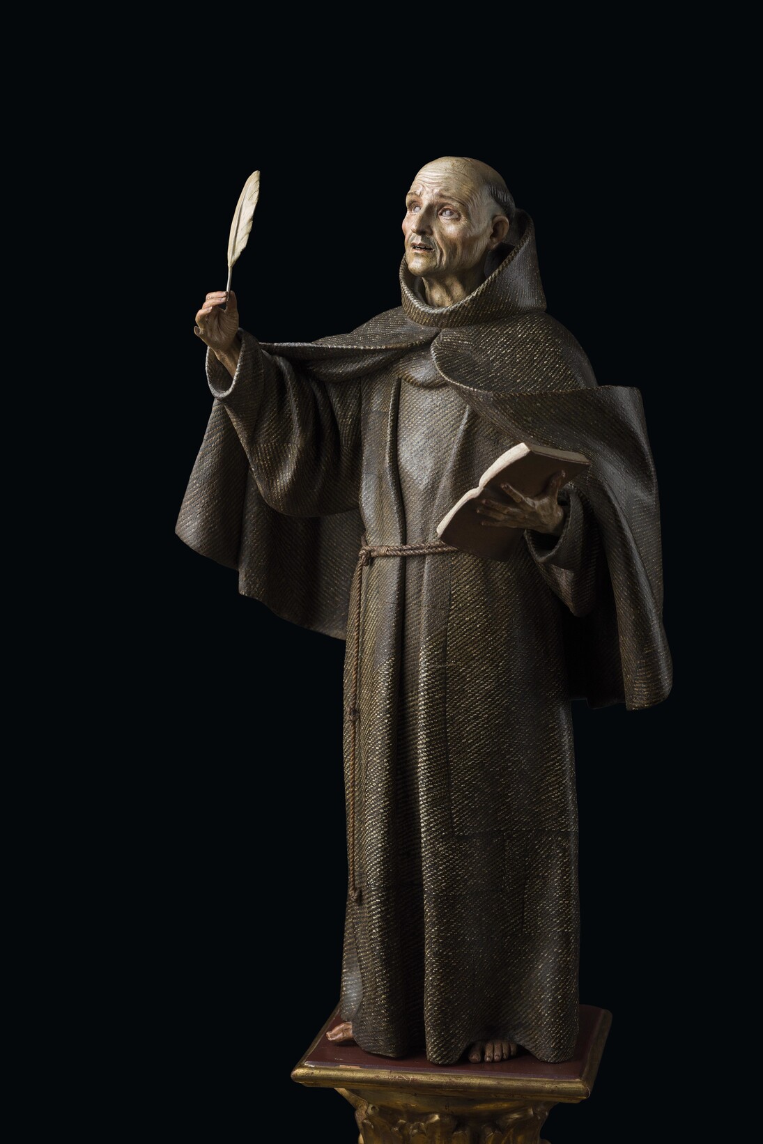 Pedro de Mena y Medrano, San Pedro de Alcantara, Polychrome wood inset with reverse painted glass eyes and hair eyelashes, Circa 1670, 40 cm. high, the figure. Coll & Cortés, London & Madrid