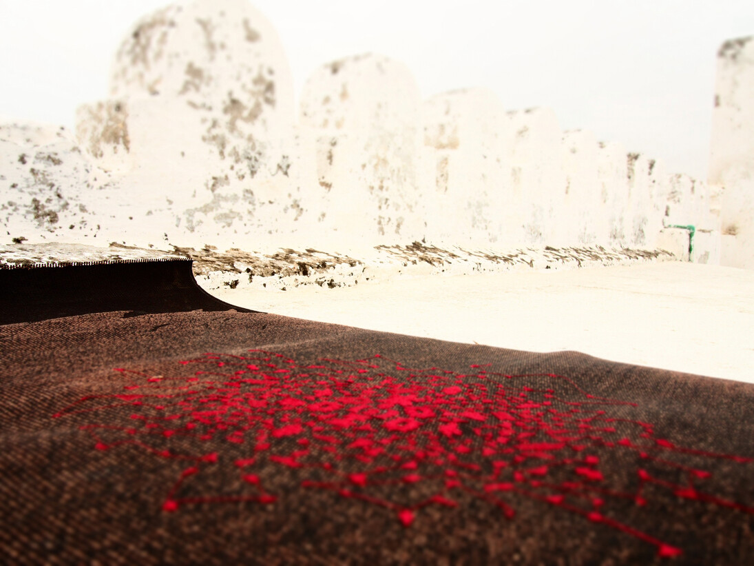 Sara Ouhaddou, Recycled rubberized cloth and silk embroidery