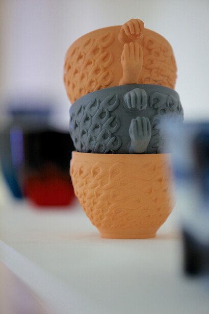 Installation view of Many a Slip, invited artists juggle with the domestic symbol of 'the cup' (2015) at Marsden Woo Gallery, focus on John Rainey,  image © Philip Sayer, courtesy of Marsden Woo Gallery, London