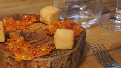 Fried chickpea-flour squares (based on the traditional farinata) and pecorino crackers with dots of purée of smokes paprika