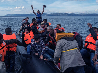Migrants crossing the sea in an inflatable boat between Turkey and Greece