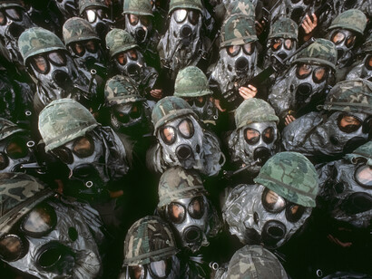 Fort Dix, New Jersey / May, 1980. Men and women finally equal in the American Army. In 1980 the US allows women to actively serve in the military. Here, women take part in basic training against atomic radiation.