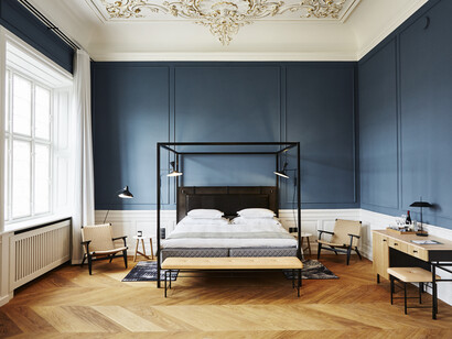 The elegant deluxe room at Nobis Hotel, where minimalist design and luxurious comfort create the perfect space for relaxation, Copehagen, Denmark