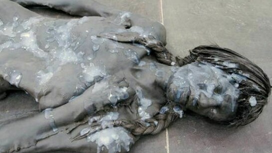 Andra Ursuta, Crush (detail), 2011, Cast urethane, wax, sneakers, wig, silicone. 60 x 40 x 9 in. (152 x 102 x 23 cm). Courtesy of the artist and Ramiken Crucible, New York.