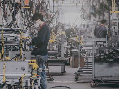 In China, an advanced automobile factory employs cutting-edge welding technology, skillfully crafting vehicles with unparalleled precision and efficiency