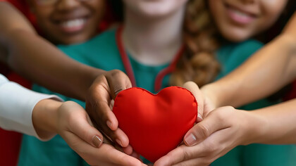 Hands forming a heart shape, symbolizing kindness and compassion