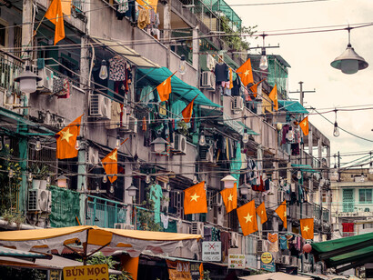 Vietnamese flags as a display of Vietnamese patriotism. Such patriotism is seen as inherent to Vietnamese people, passed down through generations, and is already established as a major part of their culture