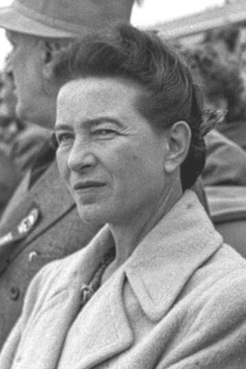 Simone de Beauvoir and Jean-Paul Sartre attending the ceremony of 6th Anniversary of Founding of Communist China in Beijing on 1 October 1955 in Tiananmen square, China