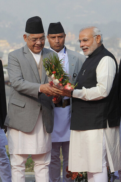 The Prime Minister, Shri Narendra Modi being received on his arrival at Tribhuvan International Airport, Kathmandu, to attend the 18th SAARC Summit, in Nepal on November 25, 2014
