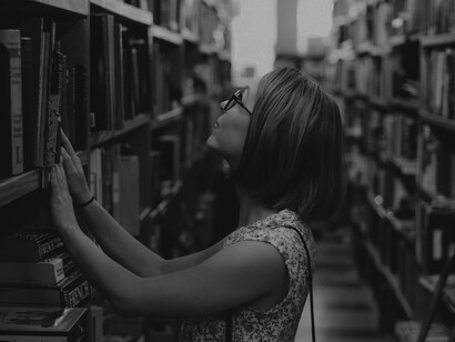 A girl in her university is looking for research books to support her stated problem in her thesis 