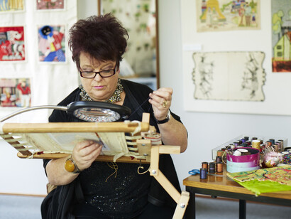 Embroiderers' Guild member Anthea Godfrey at work on 'Magna Carta (An Embroidery)' by Cornelia Parker, Photograph by Joseph Turp