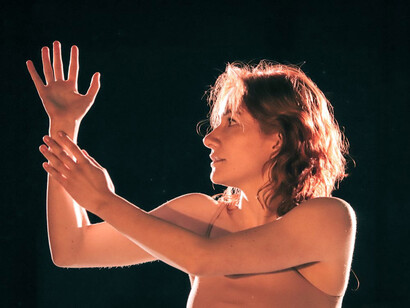 Her dance whispers of a search for spiritual fulfillment, transcending earthly constraints with grace and fluidity