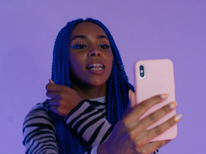 Dancing her way through trends, she embodies the 'see now, buy now' mentality, demonstrating how quickly fashion can evolve in the digital age