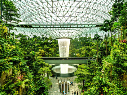A large indoor waterfall at Jewel Changi Airport in Singapore