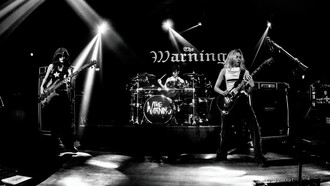 Alejandra (left), Paulina (middle), and Daniela (right) performing as The Warning at the Magazzini Generali venue in Milan, Italy, on the 11th of April, 2024