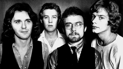 King Crimson in a 1974 press photo. The lineup depicted lasted from 1972 to 1974. The photo was distributed by Atlantic Records, which was King Crimson's record label in the US
