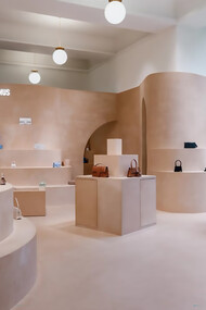 The entrance to the Jacquemus shop is a minimalist yet striking design, blending modern elegance with the brand's signature laid-back, Mediterranean aesthetic, London, UK