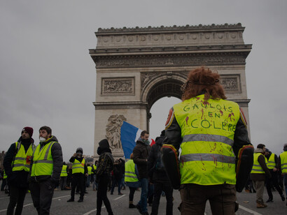 “A revolutionary slogan at the Yellow Vest demonstration on February 2, 2019, at Place de la République in Paris France. The Gilets Jaunes (Yellow Vest Movement), which began in 2018 over fuel taxes, soon grew into a broader protest against the rising cost of living and political elites