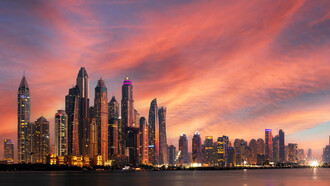 The skyline of Dubai, United Arab Emirates, the positive prospects between the UAE-Morocco partnership being represented by the beauty of the sunset, possibilities are on the horizon
