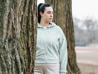 A woman who is an introvert is looking toward the distance 