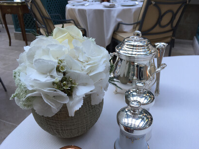Silver teapot and fresh flowers at breakfast. Ph Genevieve Northup