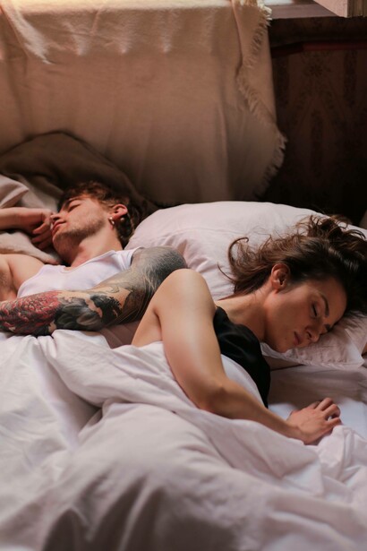 Man and woman asleep 