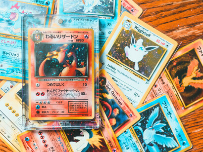 A vibrant arrangement of Pokémon cards, reflecting the cultural and financial value of collectible hobbies
