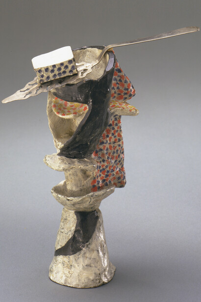 Pablo Picasso (Spanish, 1881–1973), Glass of Absinthe. Paris, spring 1914. Painted bronze with absinthe spoon. 8 1/2 x 6 1/2 x 3 3/8″ (21.6 x 16.4 x 8.5 cm), diameter at base 2 1/2″ (6.4 cm), The Museum of Modern Art, New York. Gift of Louise Reinhardt Smith. © 2014 Estate of Pablo Picasso / Artists Rights Society (ARS), New York.