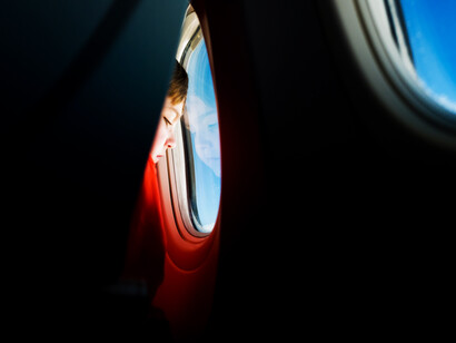 A window seat passenger on an airplane